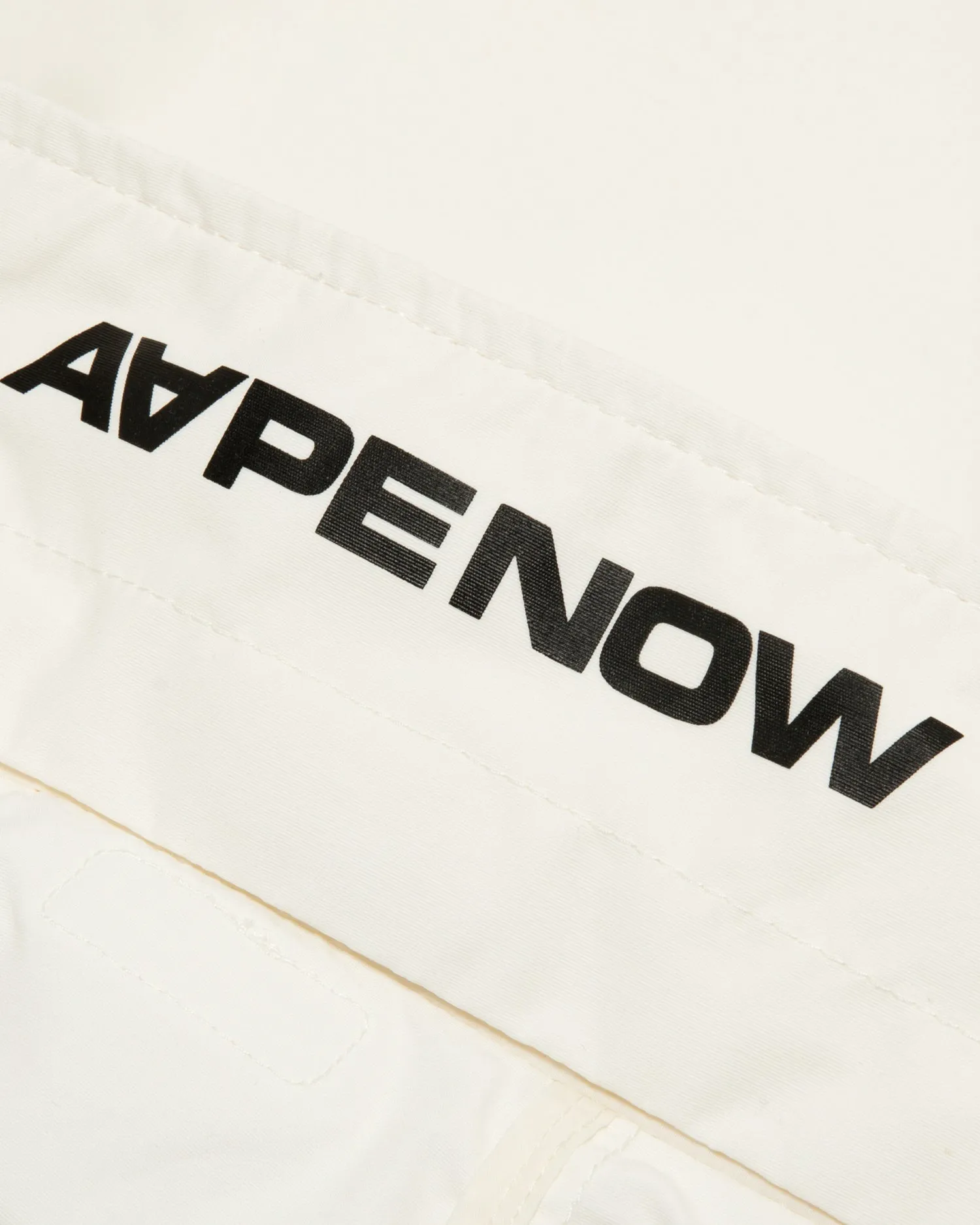 AAPENOW moonface logo half-zip jacket