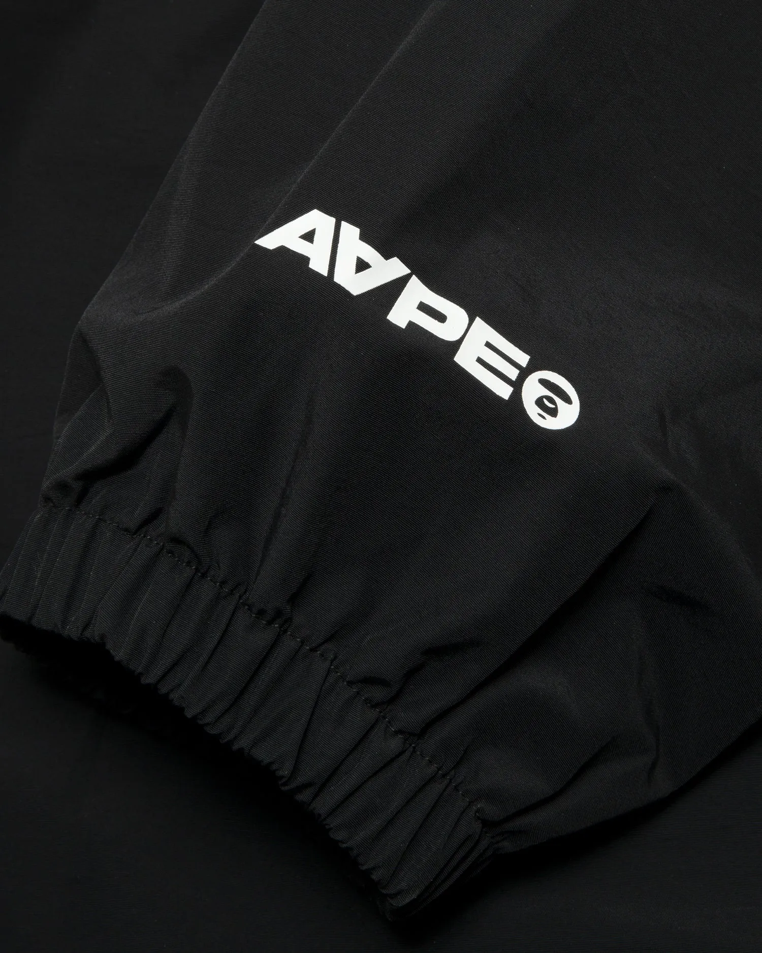 AAPENOW moonface logo half-zip jacket
