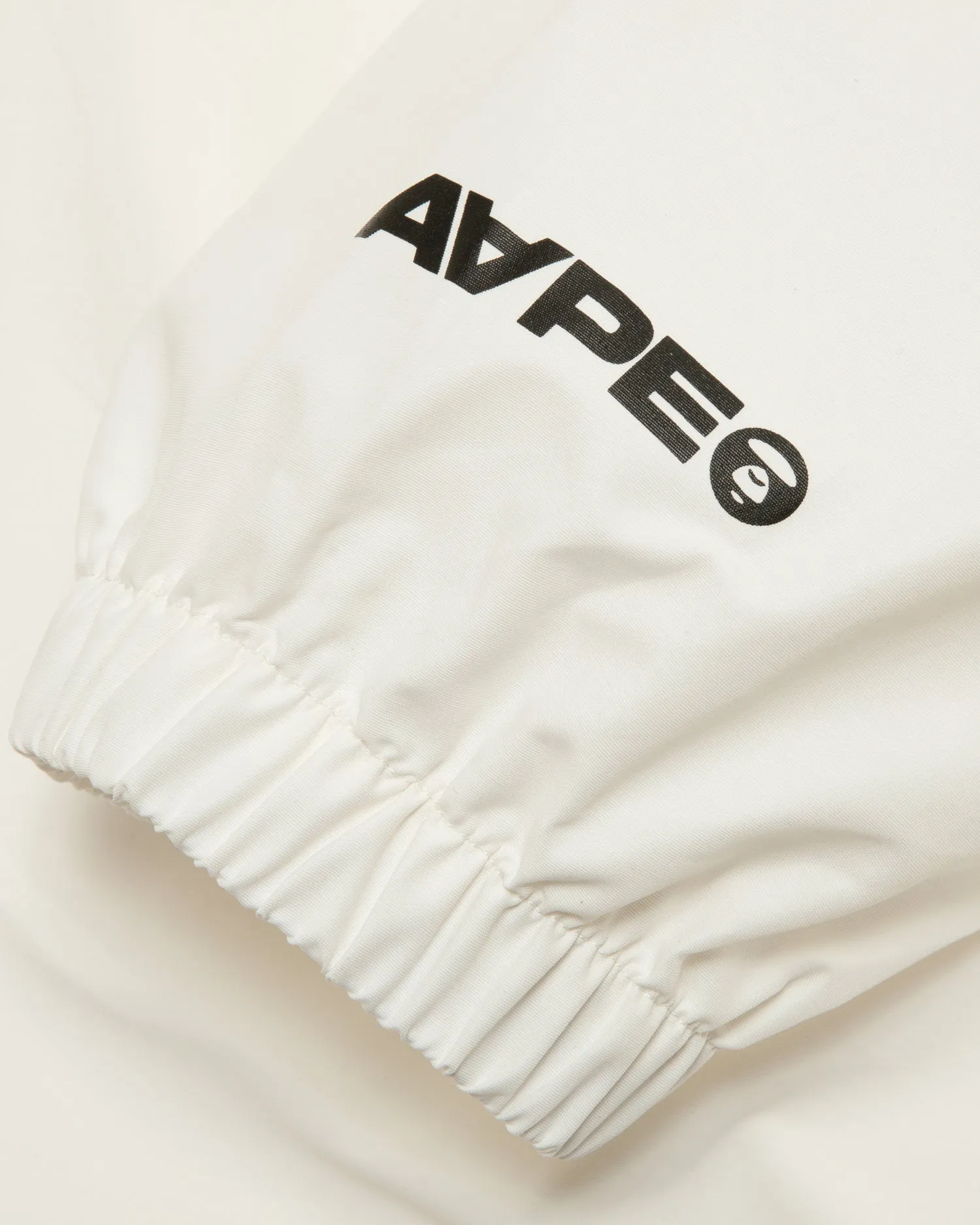 AAPENOW moonface logo half-zip jacket