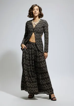 Black embellished jacket and printed flared pants