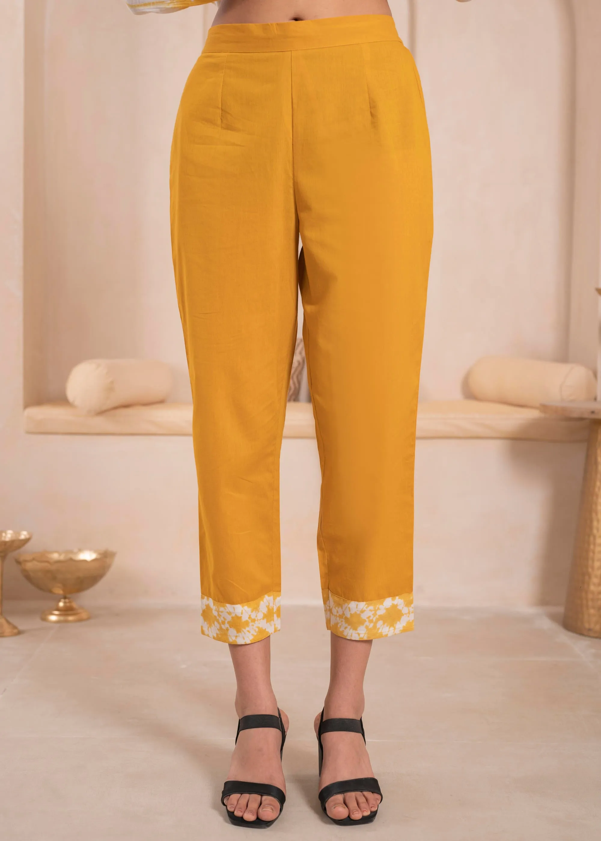 Mustarad and white kurta , solid bottom and tie - dye dupatta with cotton lace , buttons , sequince
