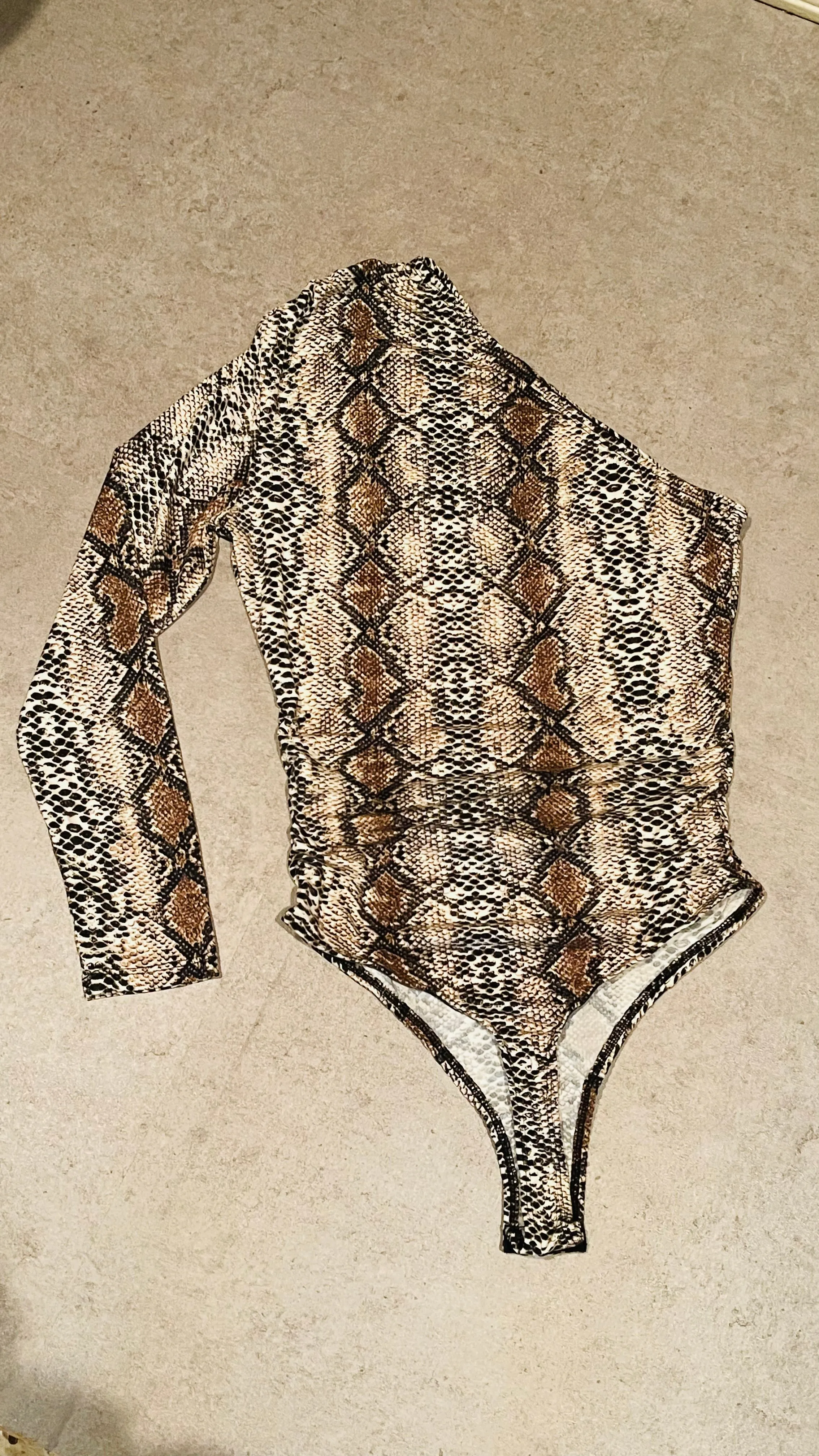 The “Don’t Be Basic” Snakeskin Bodysuit
