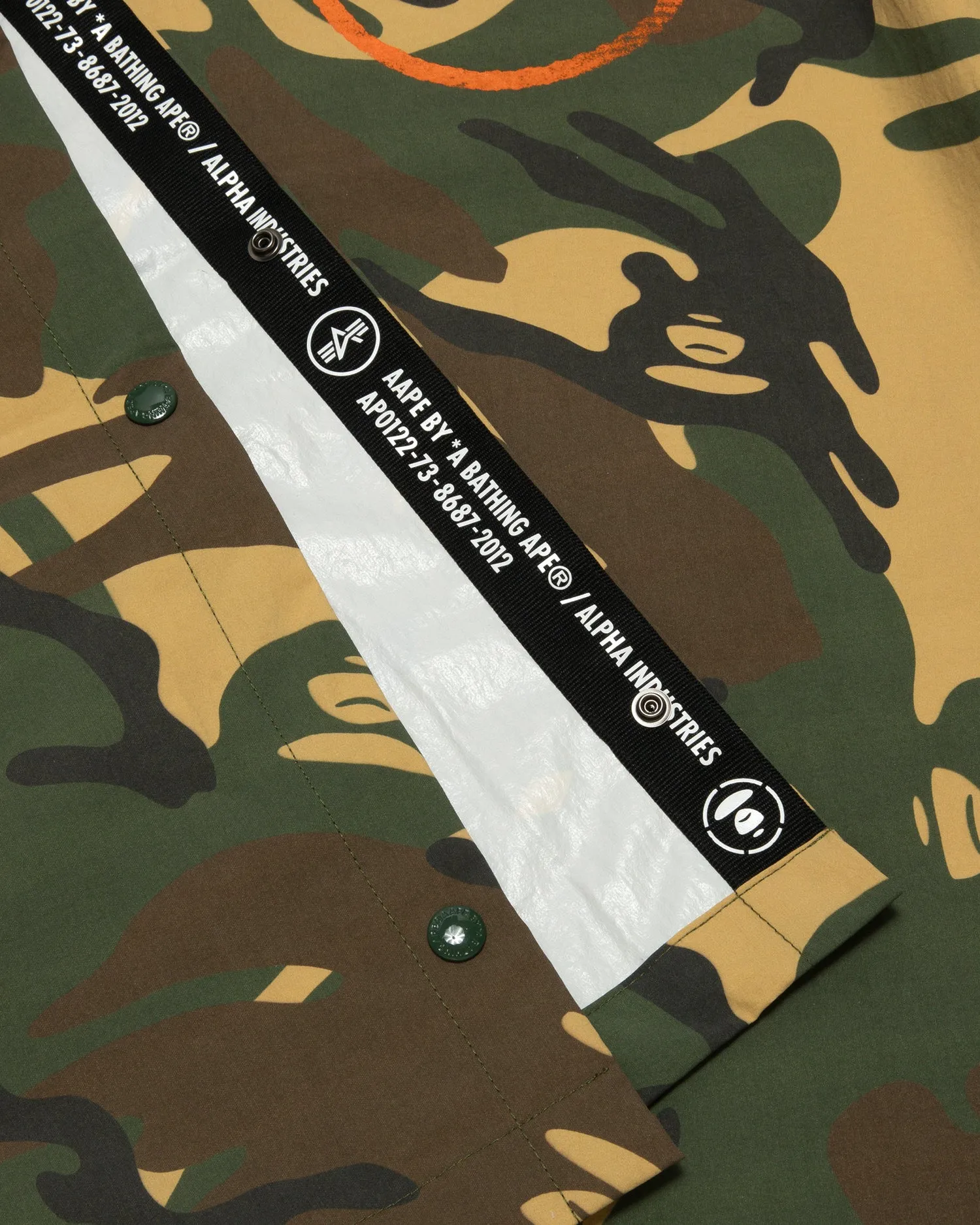 X Alpha Industries camo hooded poncho jacket