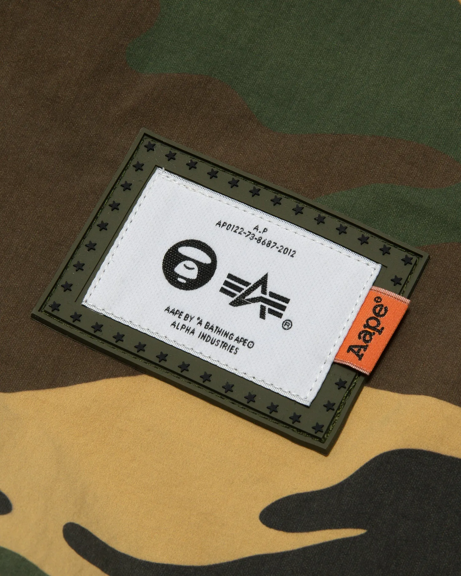 X Alpha Industries camo hooded poncho jacket